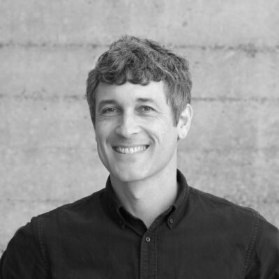 black & white headshot of a man